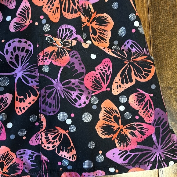 Bundle of 2 scrub tops. - Picture 9 of 10
